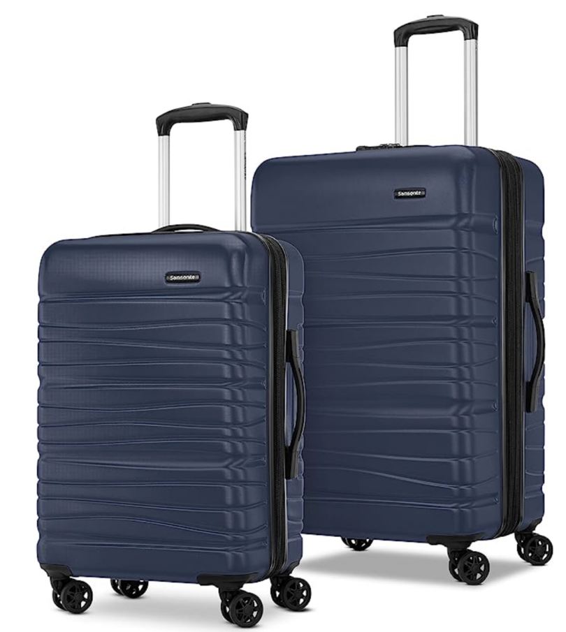 a pair of luggage with wheels